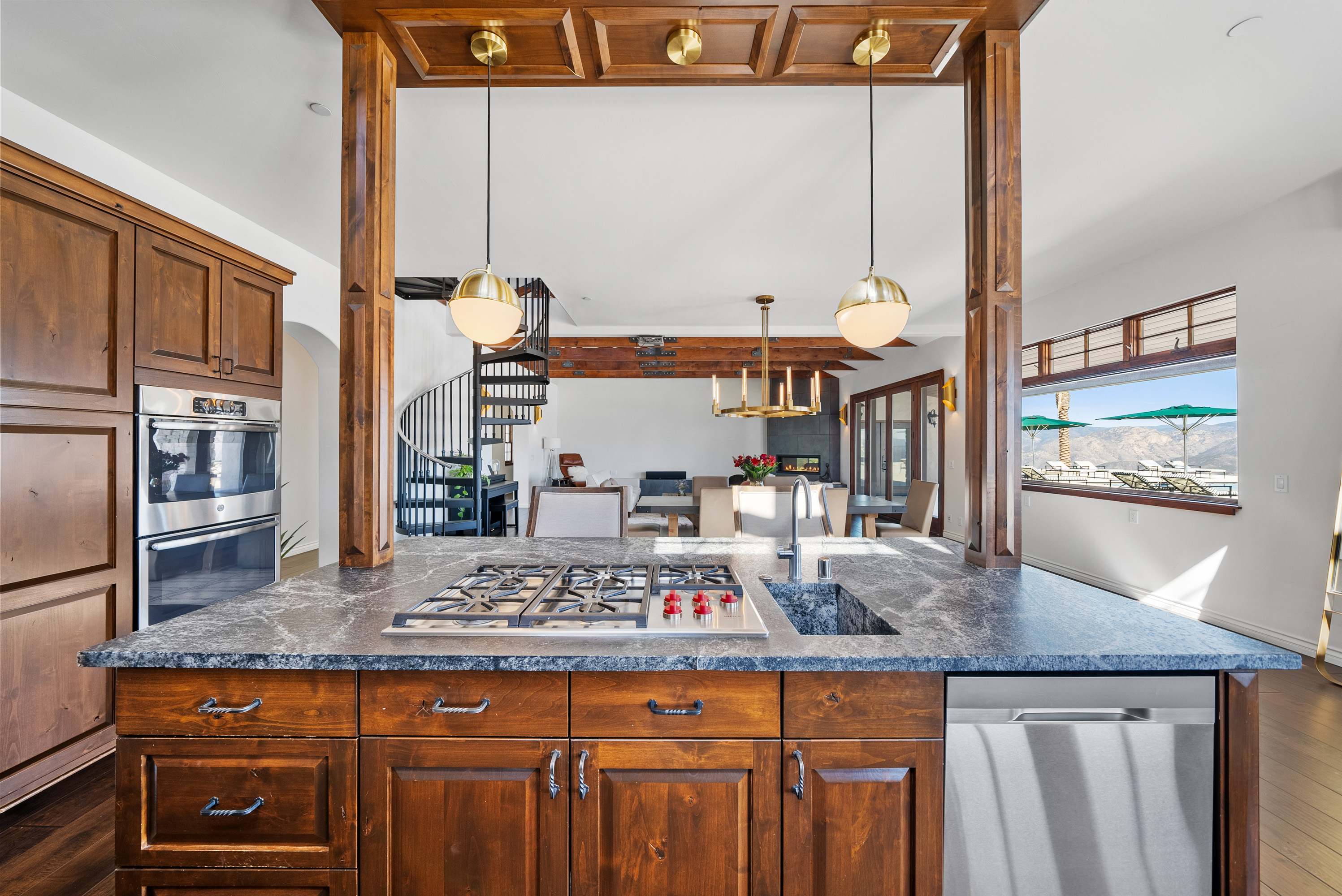 Chef's kitchen with walnut cabinetry